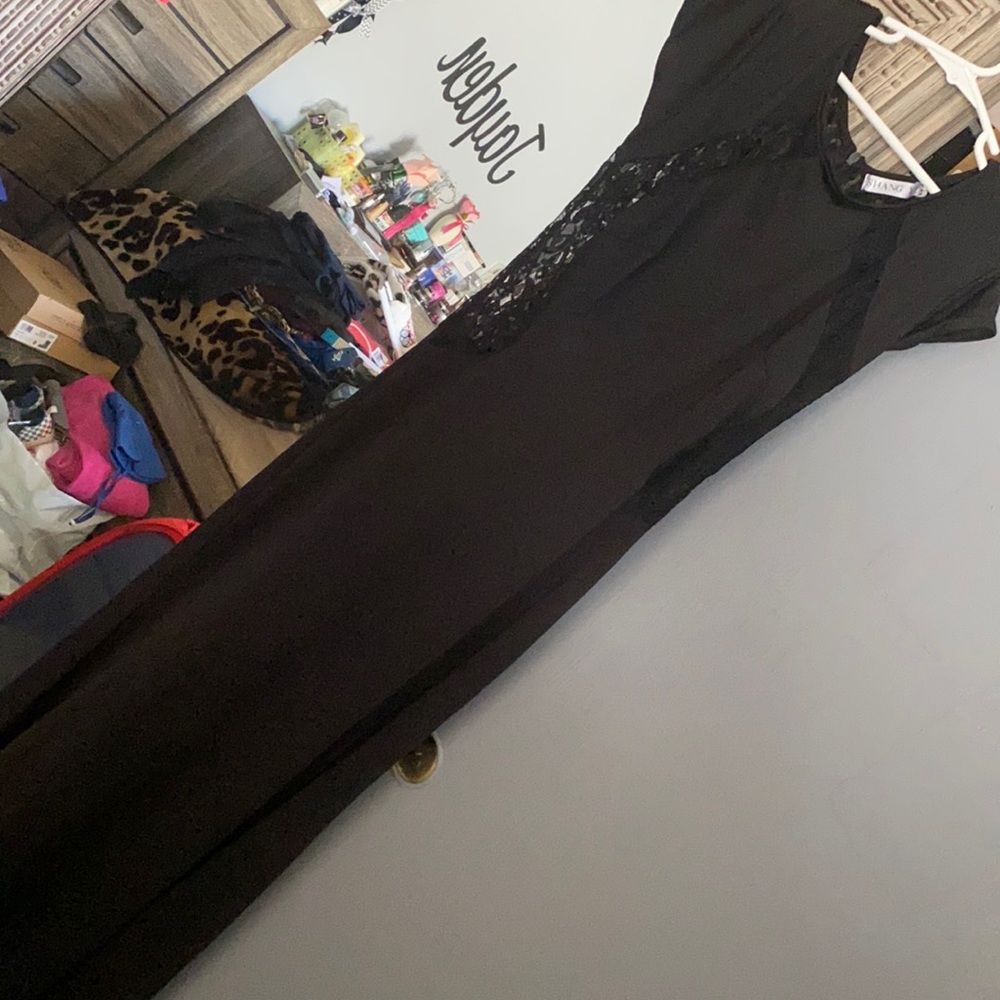 Super cute eye catching black dress w/slit on the side
